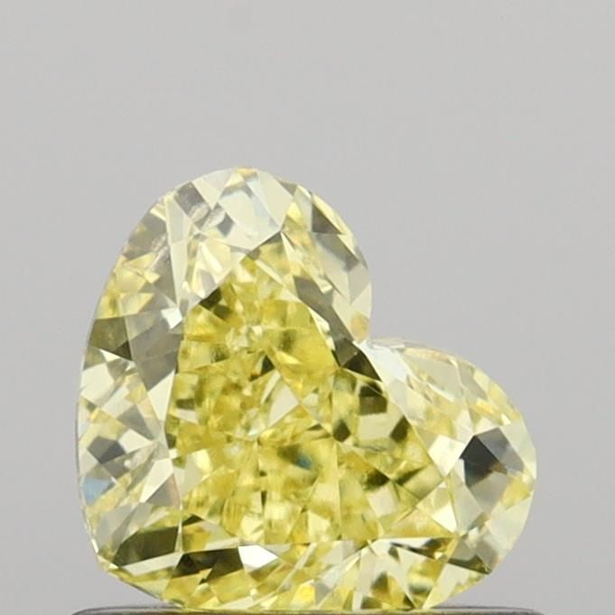 Loose Diamond - HEART 0.68ct Fancy Intense Yellow VS2: Loose Diamond - HEART 0.68ct Fancy Intense Yellow VS2 Source: This is a real non-mined Diamond that has been grown in a lab Shape: HEART Carats: 0.68 Color: Fancy Intense Yellow Certification: IGI Vid