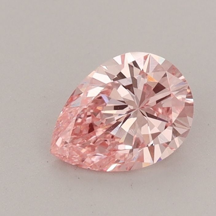 Loose Diamond - PEAR 0.6ct Fancy Vivid Pink VS1: Loose Diamond - PEAR 0.6ct Fancy Vivid Pink VS1 Source: This is a real non-mined Diamond that has been grown in a lab Shape: PEAR Carats: 0.6 Color: Fancy Vivid Pink Certification: IGI Video: