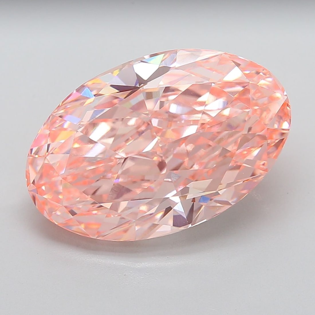 Loose Diamond - OVAL 18.08ct Fancy Vivid Pink VVS2: Loose Diamond - OVAL 18.08ct Fancy Vivid Pink VVS2 Source: This is a real non-mined Diamond that has been grown in a lab Shape: OVAL Carats: 18.08 Color: Fancy Vivid Pink Certification: IGI Video: