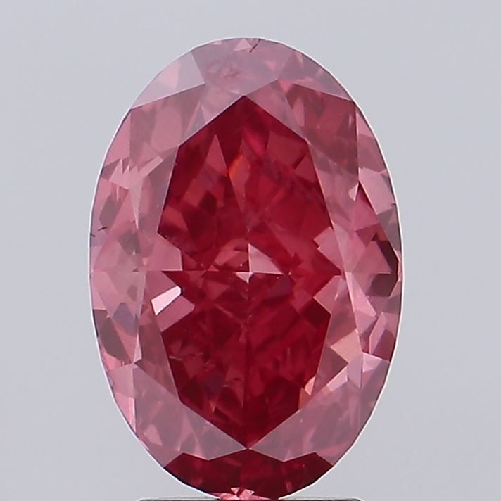 Loose Diamond - OVAL 3.04ct Fancy Vivid Pink VS1: Loose Diamond - OVAL 3.04ct Fancy Vivid Pink VS1 Source: This is a real non-mined Diamond that has been grown in a lab Shape: OVAL Carats: 3.04 Color: Fancy Vivid Pink Certification: IGI Video: