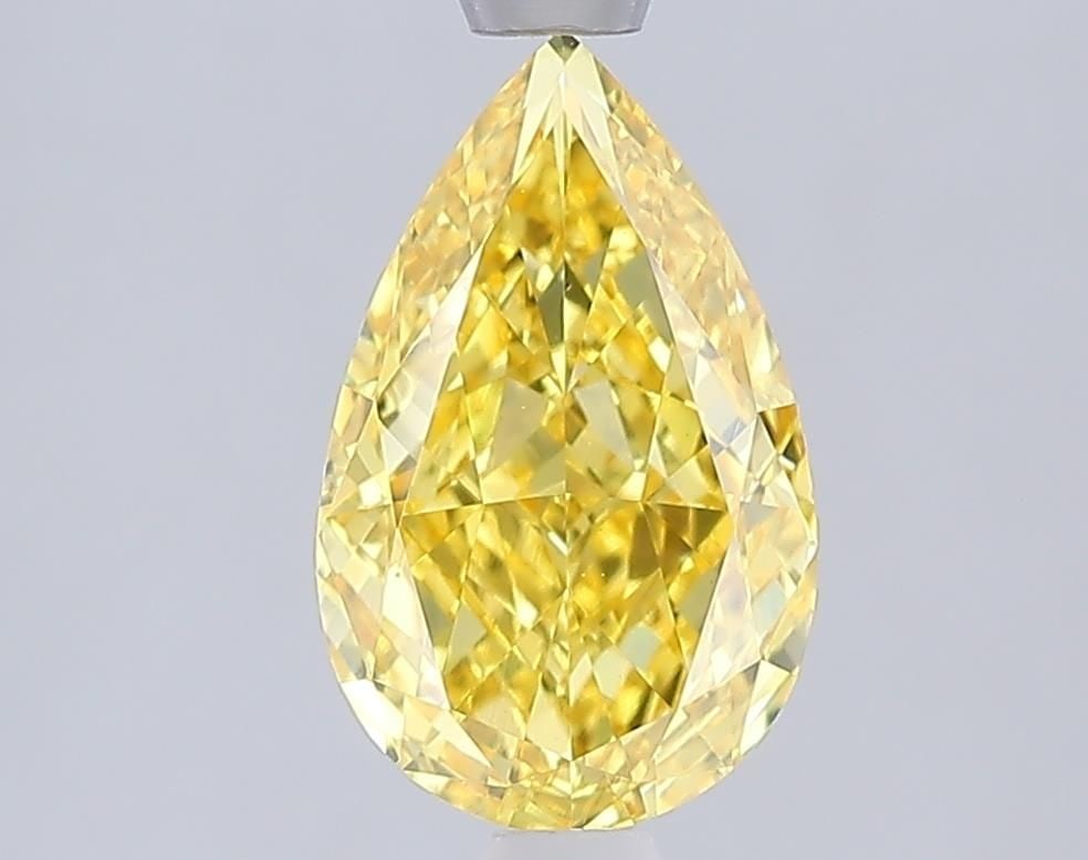 Loose Diamond - PEAR 1.95ct Fancy Vivid Yellow VS1: Loose Diamond - PEAR 1.95ct Fancy Vivid Yellow VS1 Source: This is a real non-mined Diamond that has been grown in a lab Shape: PEAR Carats: 1.95 Color: Fancy Vivid Yellow Certification: IGI Video: