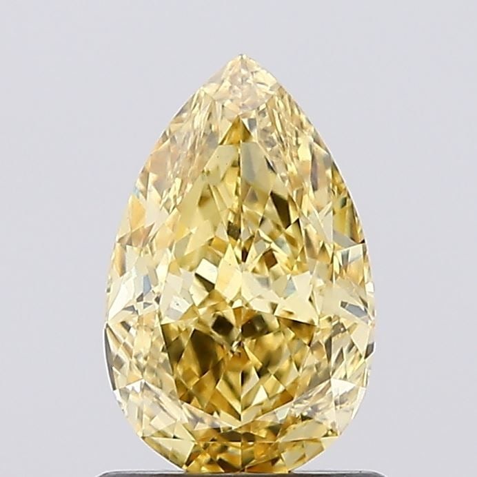Loose Diamond - PEAR 1.1ct Fancy Vivid Yellow VS1: Loose Diamond - PEAR 1.1ct Fancy Vivid Yellow VS1 Source: This is a real non-mined Diamond that has been grown in a lab Shape: PEAR Carats: 1.1 Color: Fancy Vivid Yellow Certification: IGI Video: