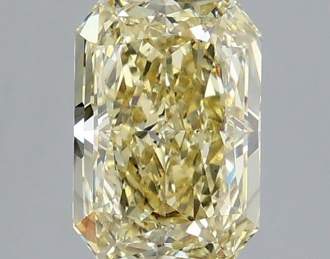 Loose Diamond - RADIANT 2.6ct Fancy Yellow SI1: Loose Diamond - RADIANT 2.6ct Fancy Yellow SI1 Source: This is a real non-mined Diamond that has been grown in a lab Shape: RADIANT Carats: 2.6 Color: Fancy Yellow Certification: IGI Video: