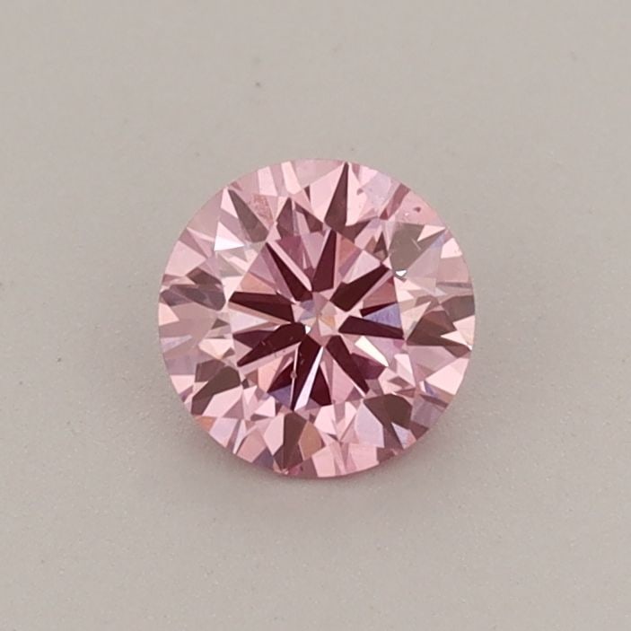 Loose Diamond - ROUND 0.42ct Fancy Vivid Pink SI1: Loose Diamond - ROUND 0.42ct Fancy Vivid Pink SI1 Source: This is a real non-mined Diamond that has been grown in a lab Shape: ROUND Carats: 0.42 Color: Fancy Vivid Pink Certification: IGI Video: