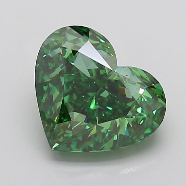 Loose Diamond - HEART 6.03ct Fancy Vivid Green VS2: Loose Diamond - HEART 6.03ct Fancy Vivid Green VS2 Source: This is a real non-mined Diamond that has been grown in a lab Shape: HEART Carats: 6.03 Color: Fancy Vivid Green Certification: IGI PLEASE NO