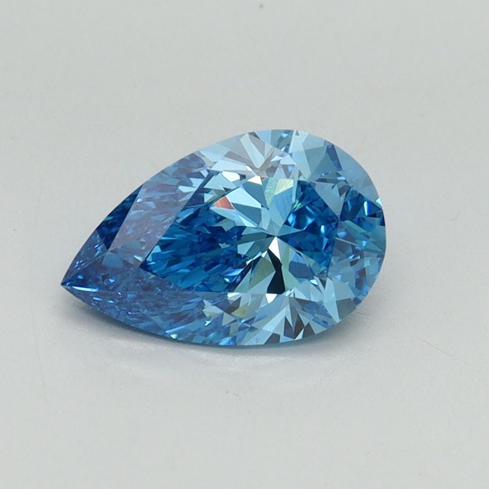 Loose Diamond - PEAR 1.06ct Fancy Vivid Blue VS1: Loose Diamond - PEAR 1.06ct Fancy Vivid Blue VS1 Source: This is a real non-mined Diamond that has been grown in a lab Shape: PEAR Carats: 1.06 Color: Fancy Vivid Blue Certification: IGI Video: Video