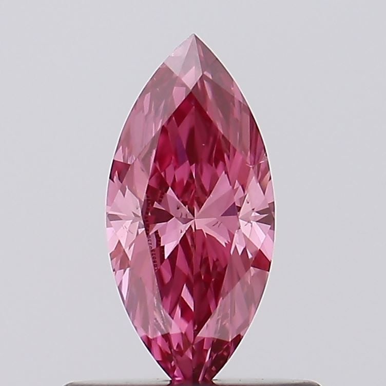 Loose Diamond - MARQUISE 0.44ct Fancy Vivid Pink VS2: Loose Diamond - MARQUISE 0.44ct Fancy Vivid Pink VS2 Source: This is a real non-mined Diamond that has been grown in a lab Shape: MARQUISE Carats: 0.44 Color: Fancy Vivid Pink Certification: IGI Video