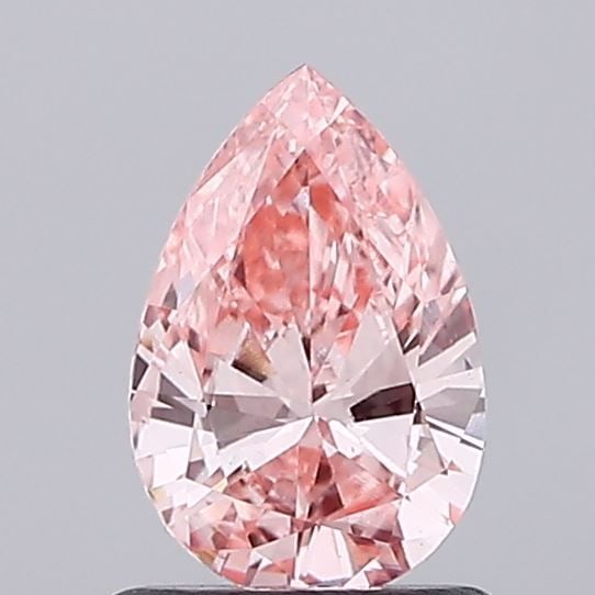 Loose Diamond - PEAR 0.78ct Fancy Vivid Pink VS2: Loose Diamond - PEAR 0.78ct Fancy Vivid Pink VS2 Source: This is a real non-mined Diamond that has been grown in a lab Shape: PEAR Carats: 0.78 Color: Fancy Vivid Pink Certification: IGI Video: