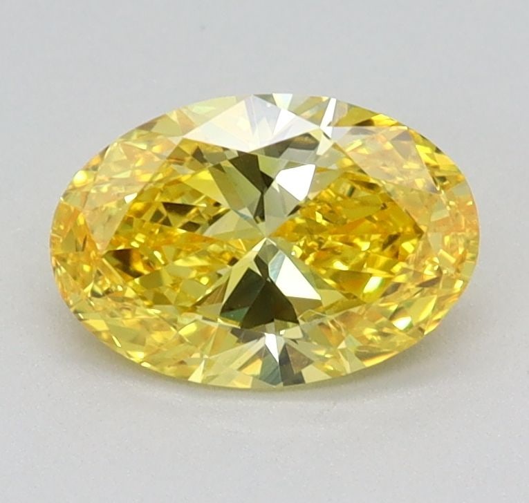 Loose Diamond - OVAL 0.71ct Fancy Vivid Yellow VS2: Loose Diamond - OVAL 0.71ct Fancy Vivid Yellow VS2 Source: This is a real non-mined Diamond that has been grown in a lab Shape: OVAL Carats: 0.71 Color: Fancy Vivid Yellow Certification: IGI Video: