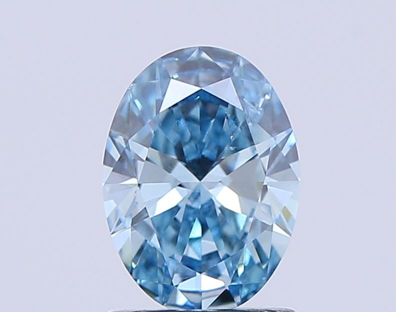 Loose Diamond - OVAL 1.04ct Fancy Vivid Blue SI2: Loose Diamond - OVAL 1.04ct Fancy Vivid Blue SI2 Source: This is a real non-mined Diamond that has been grown in a lab Shape: OVAL Carats: 1.04 Color: Fancy Vivid Blue Certification: NONE Video: