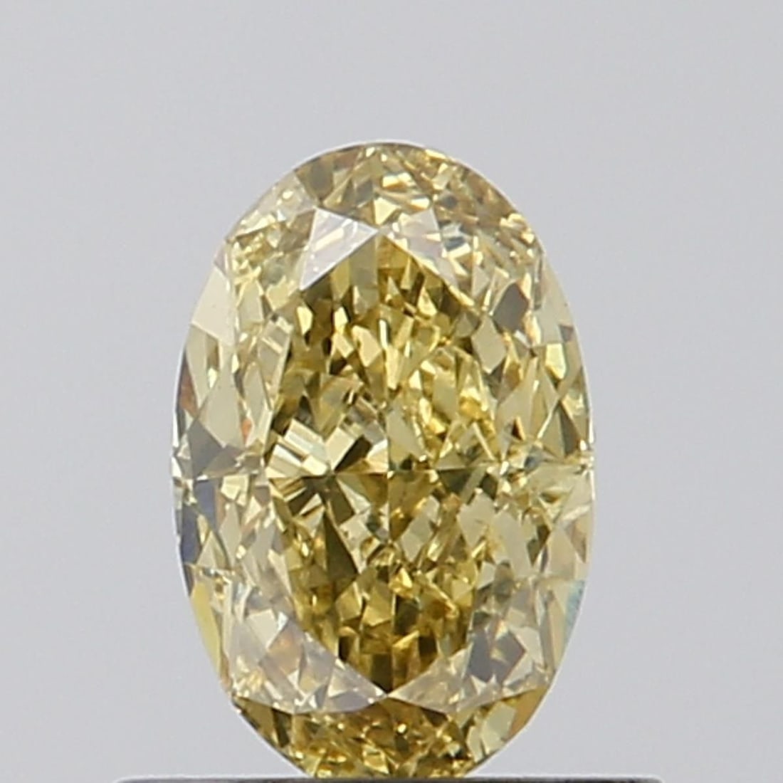 Loose Diamond - OVAL 0.82ct Fancy Vivid Yellow VS2: Loose Diamond - OVAL 0.82ct Fancy Vivid Yellow VS2 Source: This is a real non-mined Diamond that has been grown in a lab Shape: OVAL Carats: 0.82 Color: Fancy Vivid Yellow Certification: NONE Video: