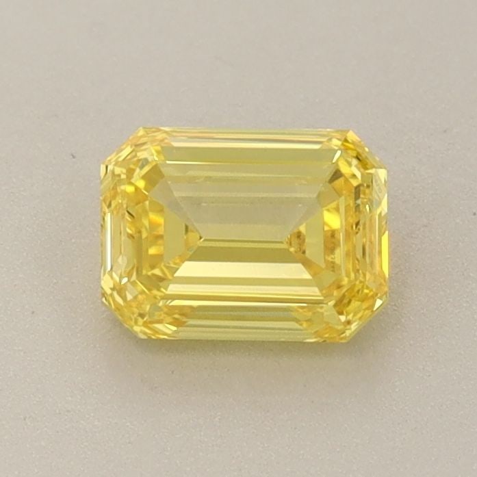 Loose Diamond - EMERALD 0.72ct Fancy Vivid Yellow VVS2: Loose Diamond - EMERALD 0.72ct Fancy Vivid Yellow VVS2 Source: This is a real non-mined Diamond that has been grown in a lab Shape: EMERALD Carats: 0.72 Color: Fancy Vivid Yellow Certification: IGI Vi