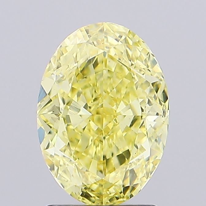 Loose Diamond - OVAL 2.11ct Fancy Vivid Yellow VS2: Loose Diamond - OVAL 2.11ct Fancy Vivid Yellow VS2 Source: This is a real non-mined Diamond that has been grown in a lab Shape: OVAL Carats: 2.11 Color: Fancy Vivid Yellow Certification: IGI Video: