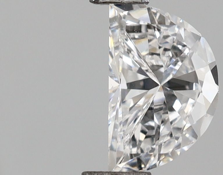 Loose Diamond - HALF MOON 0.53ct D VVS2: Loose Diamond - HALF MOON 0.53ct D VVS2 Source: This is a real non-mined Diamond that has been grown in a lab Shape: HALF MOON Carats: 0.53 Color: D Clarity: VVS2 Certification: IGI Video: