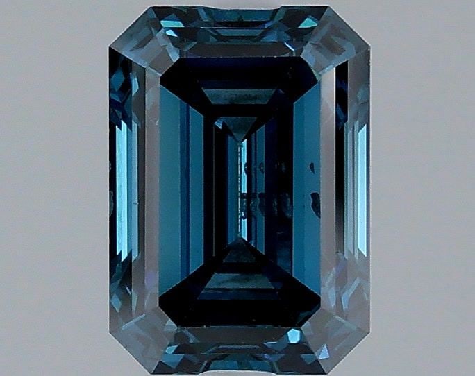 Loose Diamond - EMERALD 1.71ct Fancy Deep Blue SI1: Loose Diamond - EMERALD 1.71ct Fancy Deep Blue SI1 Source: This is a real non-mined Diamond that has been grown in a lab Shape: EMERALD Carats: 1.71 Color: Fancy Deep Blue Certification: IGI Video: