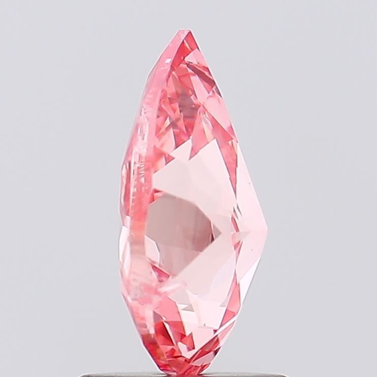 Loose Diamond - PEAR 1.52ct Fancy Vivid Pink I1: Loose Diamond - PEAR 1.52ct Fancy Vivid Pink I1 Source: This is a real non-mined Diamond that has been grown in a lab Shape: PEAR Carats: 1.52 Color: Fancy Vivid Pink Certification: IGI Video: