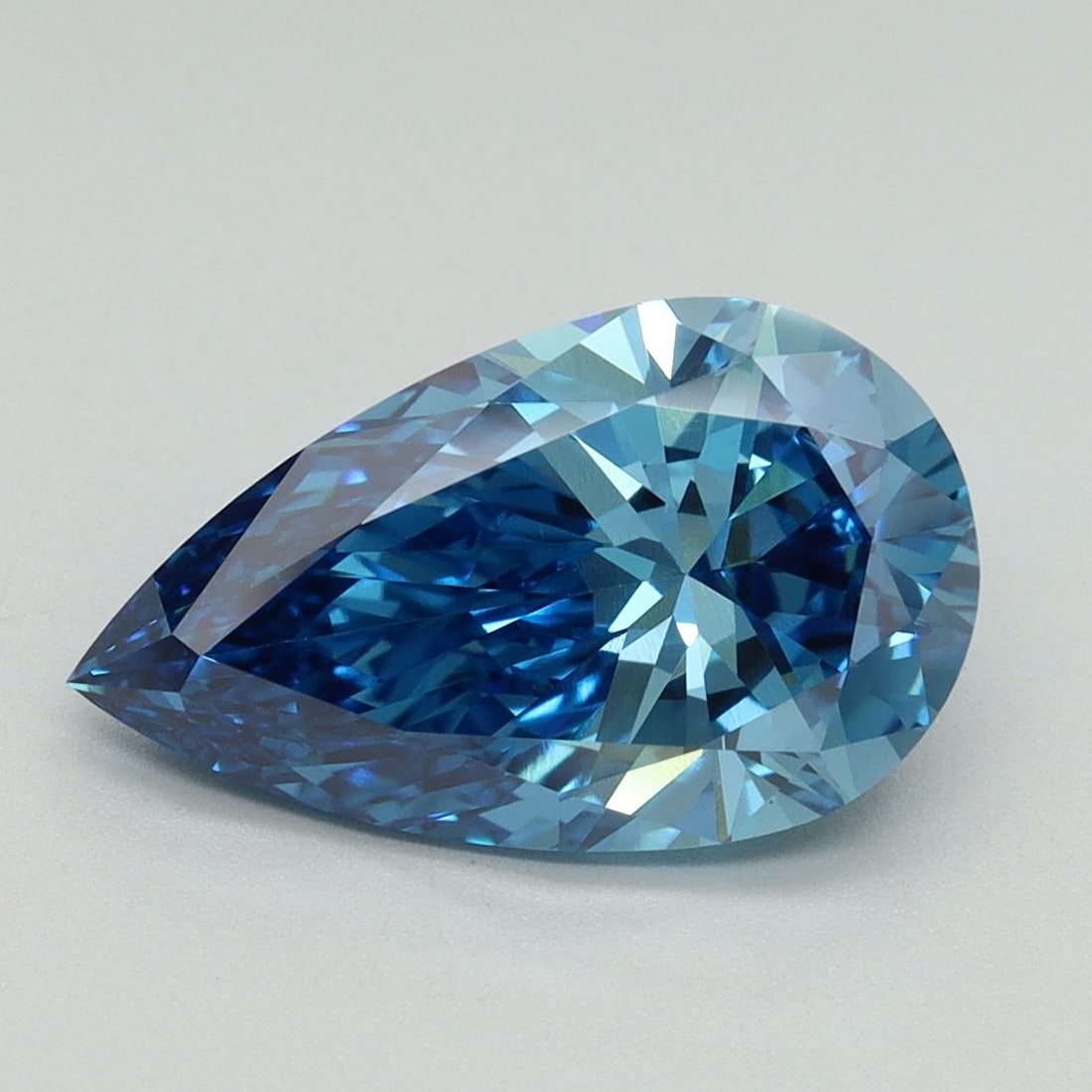 Loose Diamond - PEAR 3.08ct Fancy Vivid Blue VVS2: Loose Diamond - PEAR 3.08ct Fancy Vivid Blue VVS2 Source: This is a real non-mined Diamond that has been grown in a lab Shape: PEAR Carats: 3.08 Color: Fancy Vivid Blue Certification: IGI Video:
