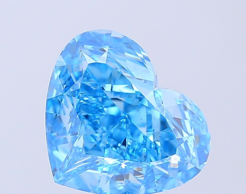 Loose Diamond - HEART 6.19ct Fancy Vivid Blue VS1: Loose Diamond - HEART 6.19ct Fancy Vivid Blue VS1 Source: This is a real non-mined Diamond that has been grown in a lab Shape: HEART Carats: 6.19 Color: Fancy Vivid Blue Certification: IGI Video: