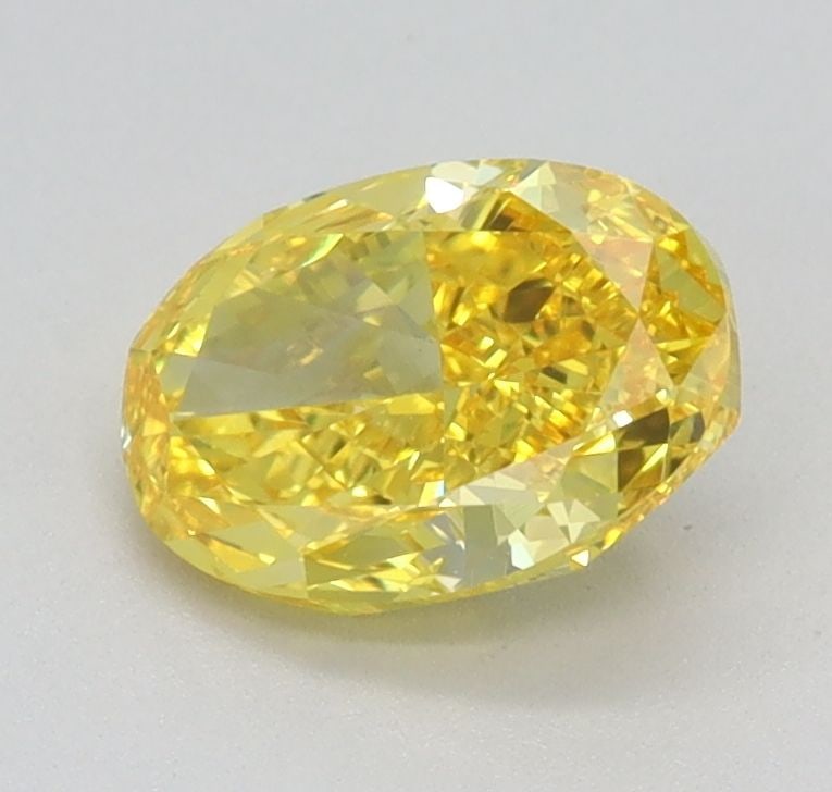 Loose Diamond - OVAL 0.85ct Fancy Vivid Yellow VVS1: Loose Diamond - OVAL 0.85ct Fancy Vivid Yellow VVS1 Source: This is a real non-mined Diamond that has been grown in a lab Shape: OVAL Carats: 0.85 Color: Fancy Vivid Yellow Certification: IGI Video:
