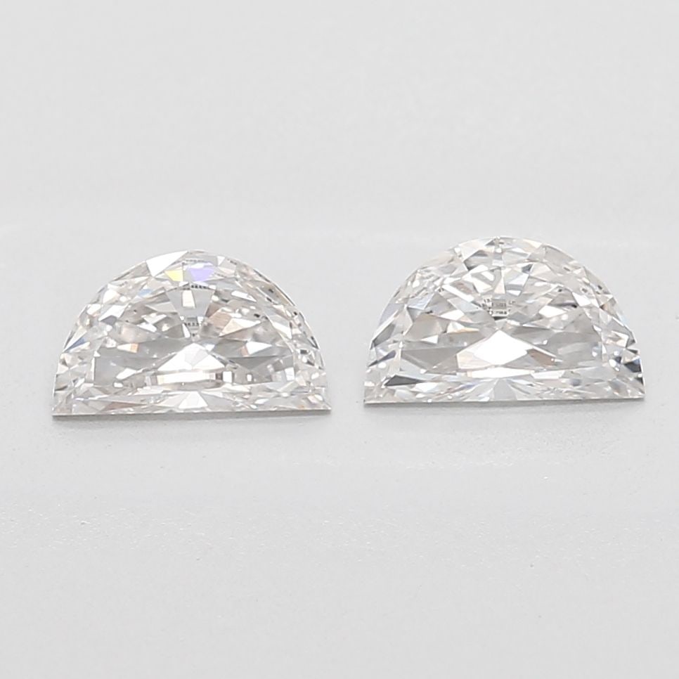 Loose Diamond - HALF MOON 0.33ct E VS1: Loose Diamond - HALF MOON 0.33ct E VS1 Source: This is a real non-mined Diamond that has been grown in a lab Shape: HALF MOON Carats: 0.33 Color: E Clarity: VS1 Certification: IGI Video: