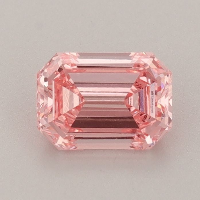 Loose Diamond - EMERALD 0.87ct Fancy Vivid Pink VS1: Loose Diamond - EMERALD 0.87ct Fancy Vivid Pink VS1 Source: This is a real non-mined Diamond that has been grown in a lab Shape: EMERALD Carats: 0.87 Color: Fancy Vivid Pink Certification: IGI Video: