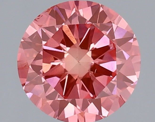 Loose Diamond - ROUND 1.66ct Fancy Vivid Pink SI1: Loose Diamond - ROUND 1.66ct Fancy Vivid Pink SI1 Source: This is a real non-mined Diamond that has been grown in a lab Shape: ROUND Carats: 1.66 Color: Fancy Vivid Pink Certification: IGI Video: