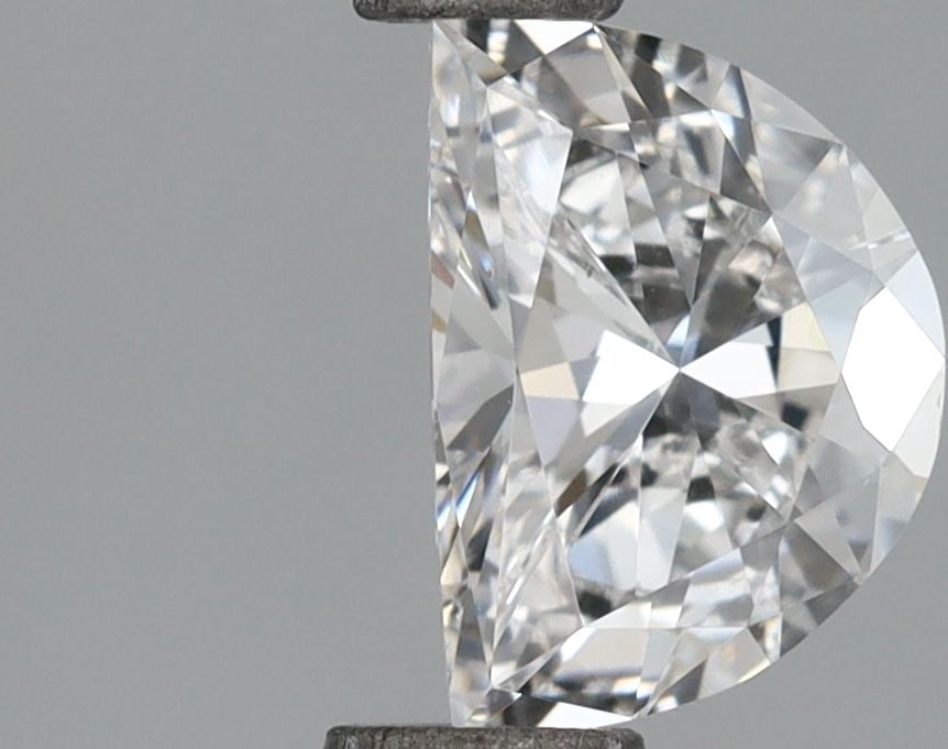 Loose Diamond - HALF MOON 0.72ct E VS2: Loose Diamond - HALF MOON 0.72ct E VS2 Source: This is a real non-mined Diamond that has been grown in a lab Shape: HALF MOON Carats: 0.72 Color: E Clarity: VS2 Certification: IGI Video: