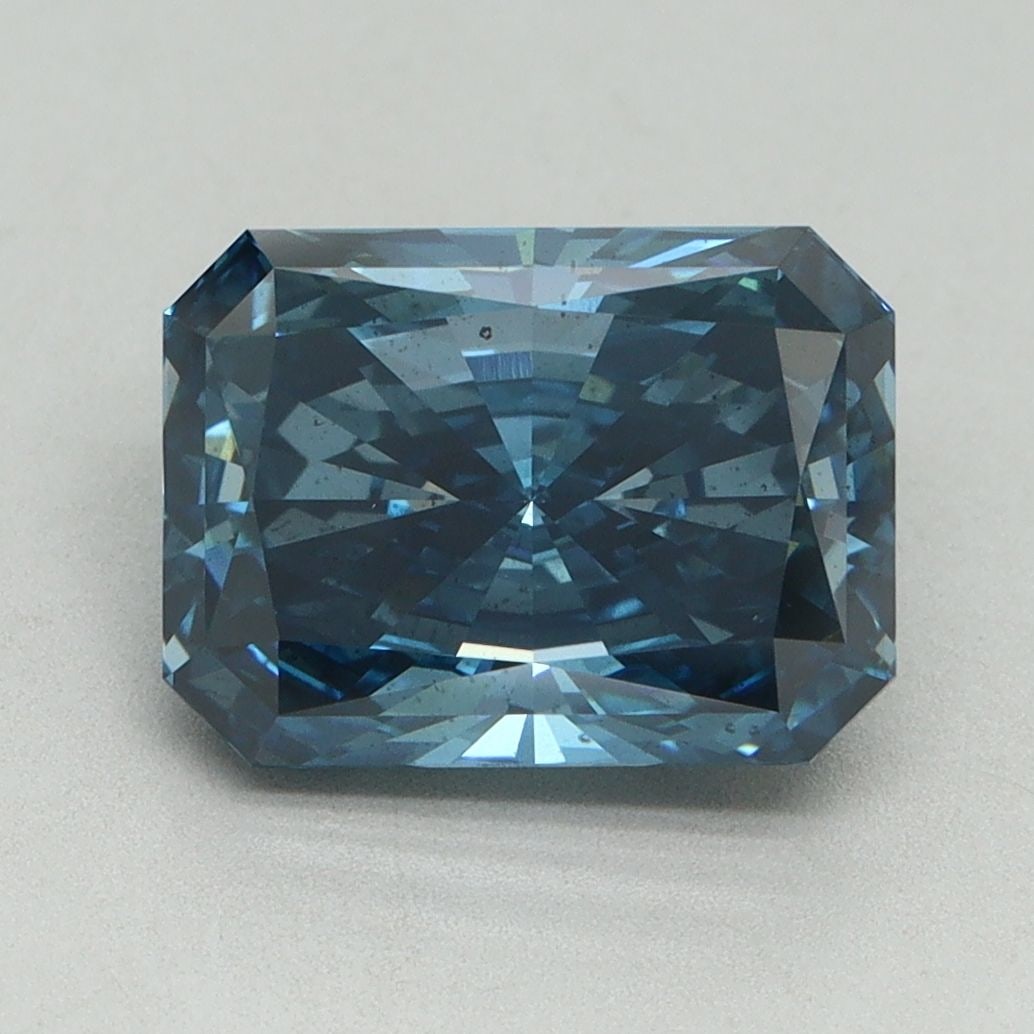 Loose Diamond - RADIANT 3.11ct Fancy Vivid Blue SI1: Loose Diamond - RADIANT 3.11ct Fancy Vivid Blue SI1 Source: This is a real non-mined Diamond that has been grown in a lab Shape: RADIANT Carats: 3.11 Color: Fancy Vivid Blue Certification: IGI Video:
