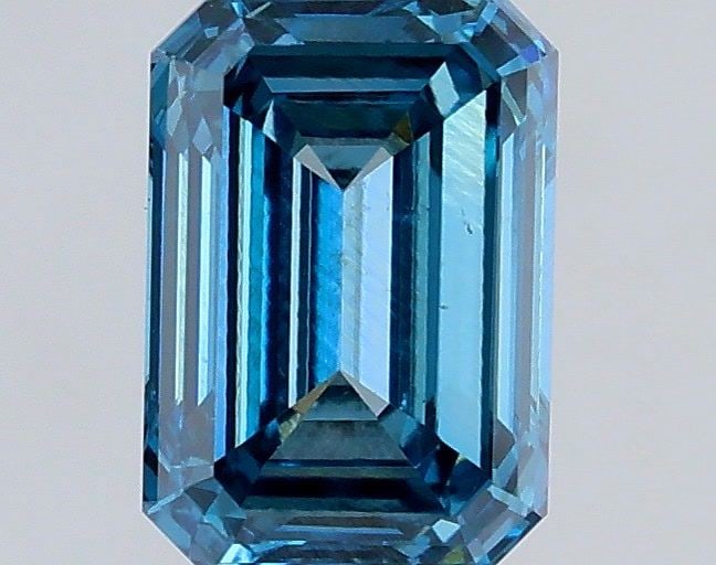 Loose Diamond - EMERALD 0.53ct Fancy Vivid Blue VS2: Loose Diamond - EMERALD 0.53ct Fancy Vivid Blue VS2 Source: This is a real non-mined Diamond that has been grown in a lab Shape: EMERALD Carats: 0.53 Color: Fancy Vivid Blue Certification: IGI Video: