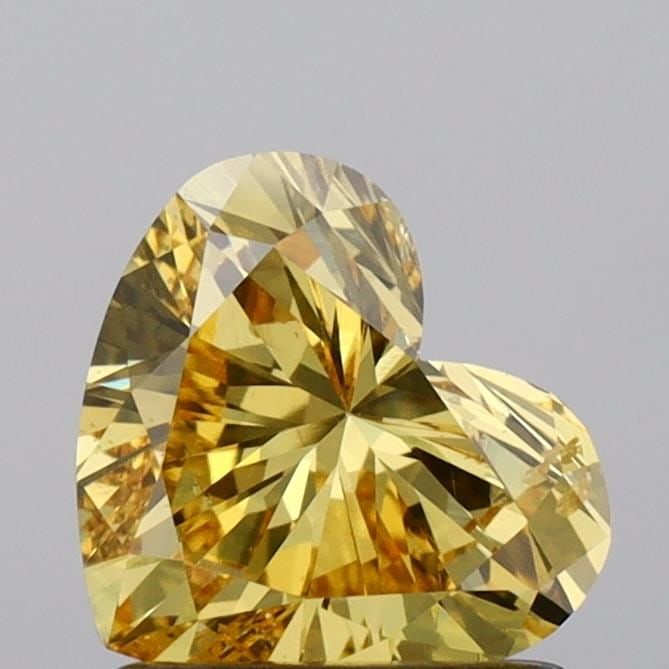 Loose Diamond - HEART 1.12ct Fancy Vivid Yellow SI1: Loose Diamond - HEART 1.12ct Fancy Vivid Yellow SI1 Source: This is a real non-mined Diamond that has been grown in a lab Shape: HEART Carats: 1.12 Color: Fancy Vivid Yellow Certification: IGI Video: