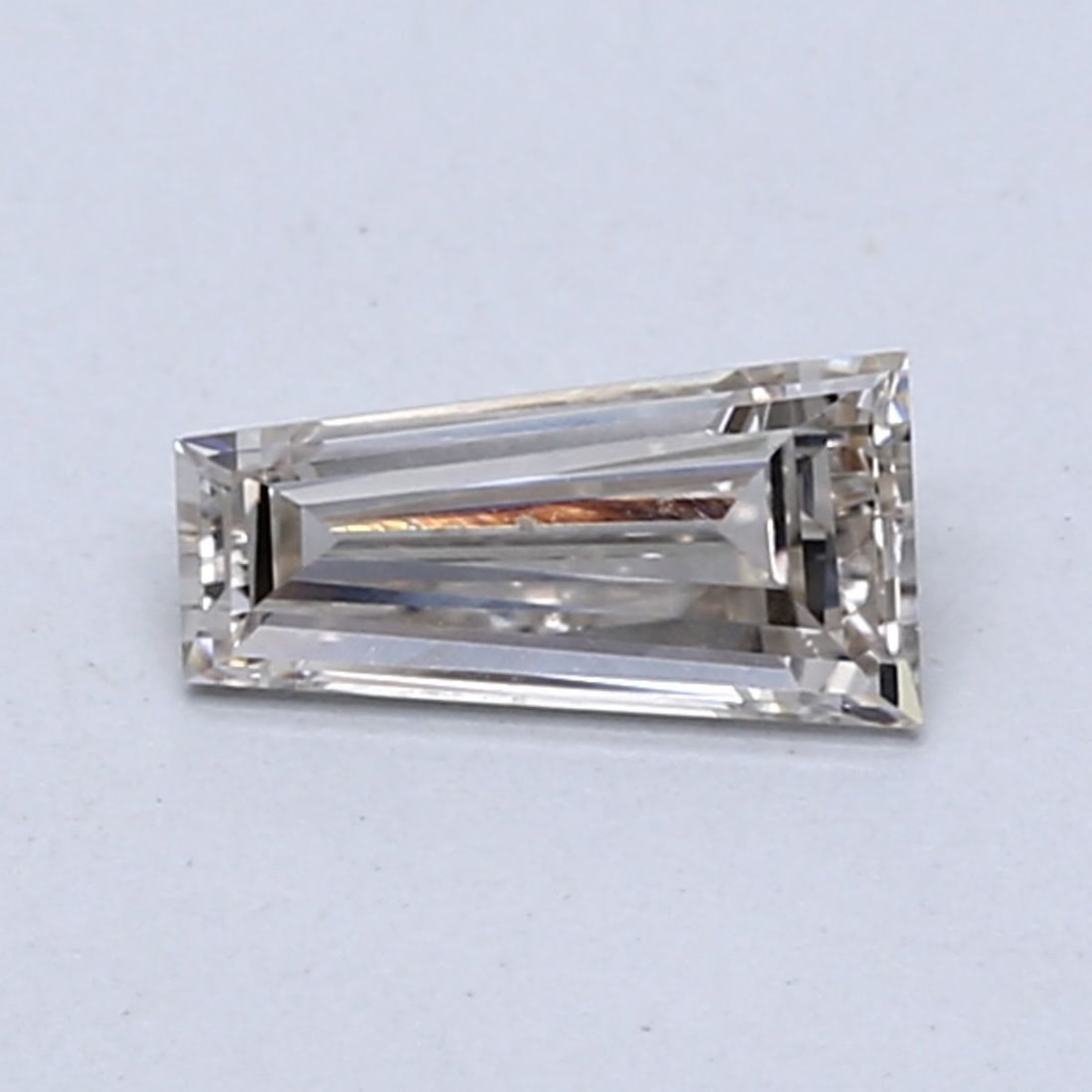 Loose Diamond - TAPERED BAGUETTE 0.49ct L VS1: Loose Diamond - TAPERED BAGUETTE 0.49ct L VS1 Source: This is a real non-mined Diamond that has been grown in a lab Shape: TAPERED BAGUETTE Carats: 0.49 Color: L Clarity: VS1 Certification: NONE Video