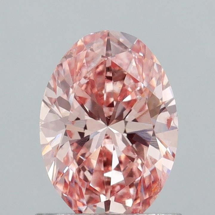 Loose Diamond - OVAL 1.01ct Fancy Intense Pink SI1: Loose Diamond - OVAL 1.01ct Fancy Intense Pink SI1 Source: This is a real non-mined Diamond that has been grown in a lab Shape: OVAL Carats: 1.01 Color: Fancy Intense Pink Certification: IGI Video: