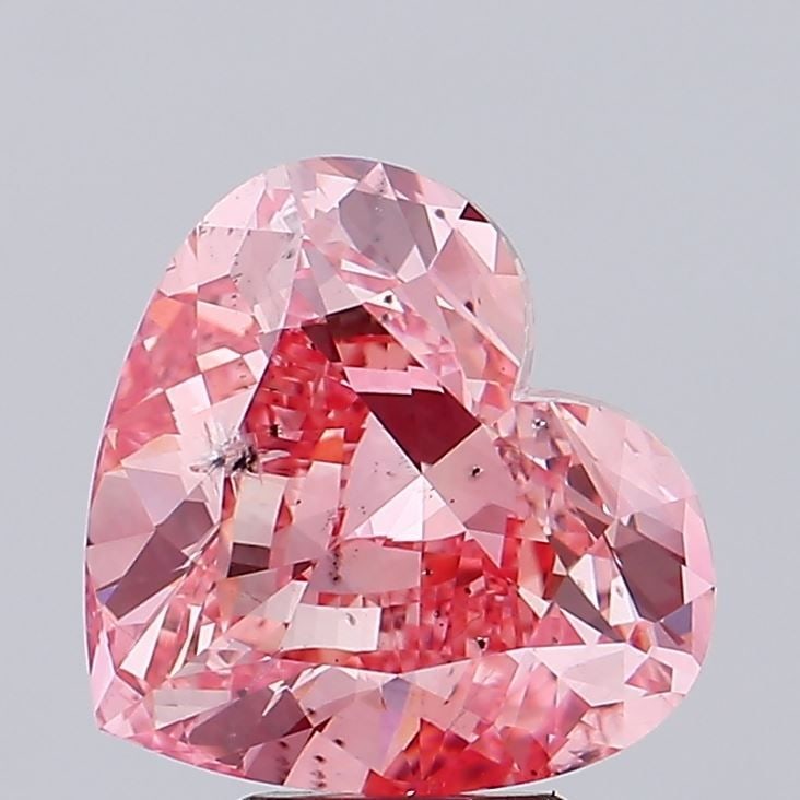 Loose Diamond - HEART 6.03ct Fancy Vivid Pink SI2: Loose Diamond - HEART 6.03ct Fancy Vivid Pink SI2 Source: This is a real non-mined Diamond that has been grown in a lab Shape: HEART Carats: 6.03 Color: Fancy Vivid Pink Certification: IGI Video: