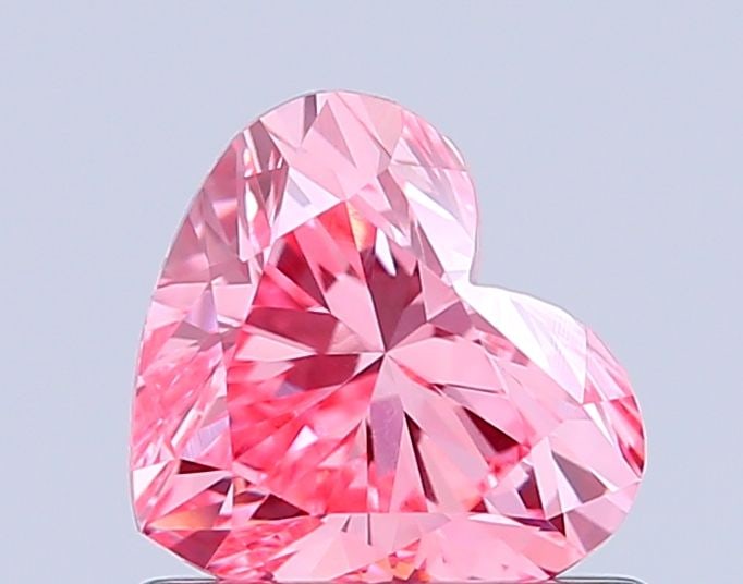 Loose Diamond - HEART 0.78ct Fancy Vivid Pink VS1: Loose Diamond - HEART 0.78ct Fancy Vivid Pink VS1 Source: This is a real non-mined Diamond that has been grown in a lab Shape: HEART Carats: 0.78 Color: Fancy Vivid Pink Certification: IGI Video: