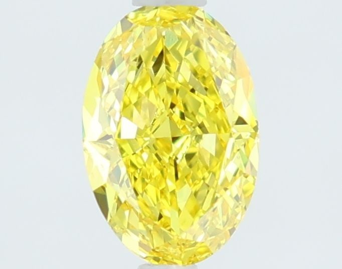 Loose Diamond - OVAL 1.27ct Fancy Vivid Yellow VS1: Loose Diamond - OVAL 1.27ct Fancy Vivid Yellow VS1 Source: This is a real non-mined Diamond that has been grown in a lab Shape: OVAL Carats: 1.27 Color: Fancy Vivid Yellow Certification: IGI Video: