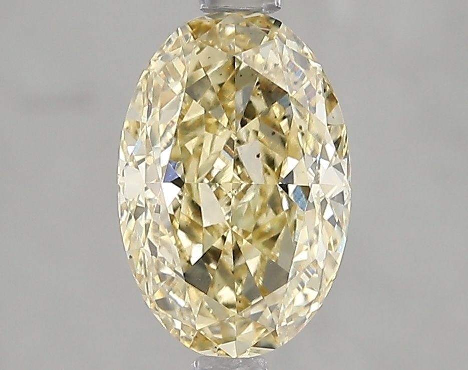 Loose Diamond - OVAL 1.87ct Fancy Yellow VS2: Loose Diamond - OVAL 1.87ct Fancy Yellow VS2 Source: This is a real non-mined Diamond that has been grown in a lab Shape: OVAL Carats: 1.87 Color: Fancy Yellow Certification: IGI Video: