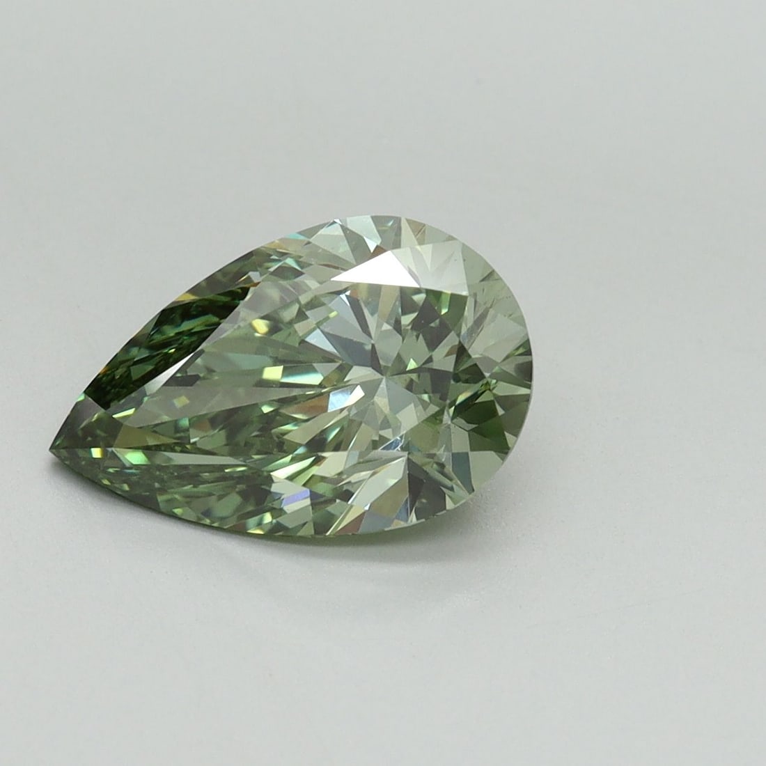 Loose Diamond - PEAR 2.08ct Fancy Vivid Green VS1: Loose Diamond - PEAR 2.08ct Fancy Vivid Green VS1 Source: This is a real non-mined Diamond that has been grown in a lab Shape: PEAR Carats: 2.08 Color: Fancy Vivid Green Certification: IGI Video: