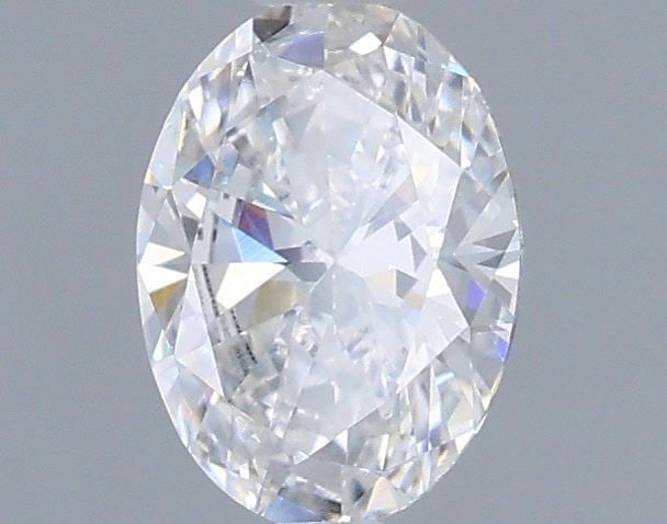 Loose Diamond - OVAL 0.71ct E VVS2: Loose Diamond - OVAL 0.71ct E VVS2 Source: This is a real non-mined Diamond that has been grown in a lab Shape: OVAL Carats: 0.71 Color: E Clarity: VVS2 Certification: IGI Video: