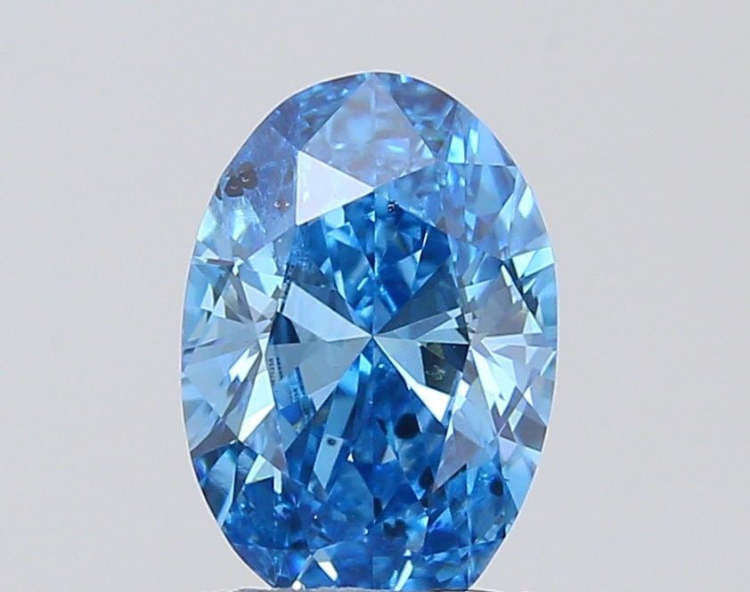 Loose Diamond - OVAL 0.92ct Fancy Vivid Blue I1: Loose Diamond - OVAL 0.92ct Fancy Vivid Blue I1 Source: This is a real non-mined Diamond that has been grown in a lab Shape: OVAL Carats: 0.92 Color: Fancy Vivid Blue Certification: IGI Video: