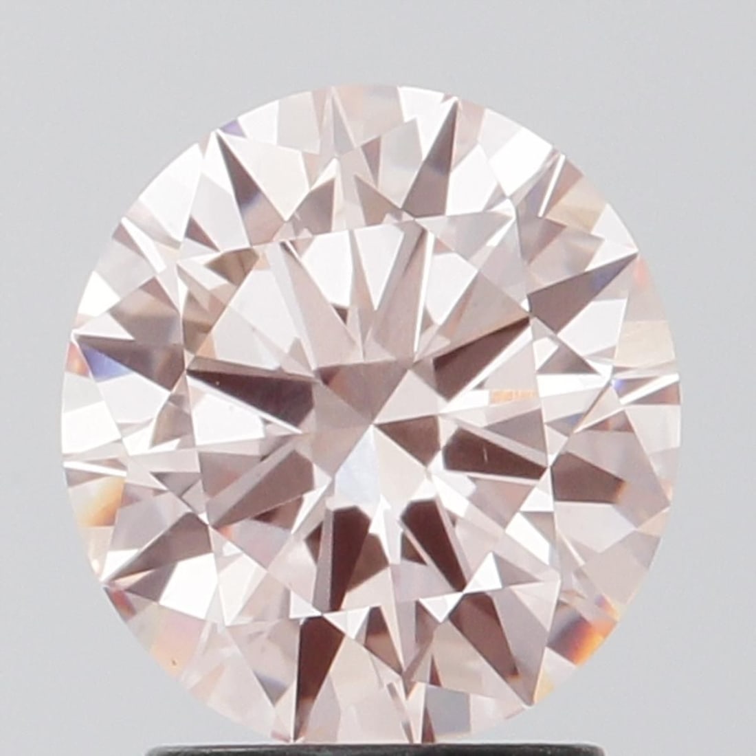 Loose Diamond - ROUND 1.9ct Fancy Intense Pink VS1: Loose Diamond - ROUND 1.9ct Fancy Intense Pink VS1 Source: This is a real non-mined Diamond that has been grown in a lab Shape: ROUND Carats: 1.9 Color: Fancy Intense Pink Certification: IGI Video: