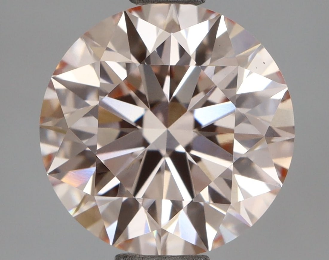 Ideal Loose Diamond - ROUND 2.34ct Fancy Pink VS1: Ideal Loose Diamond - ROUND 2.34ct Fancy Pink VS1 Source: This is a real non-mined Diamond that has been grown in a lab Shape: ROUND Carats: 2.34 Color: Fancy Pink Certification: IGI Video: