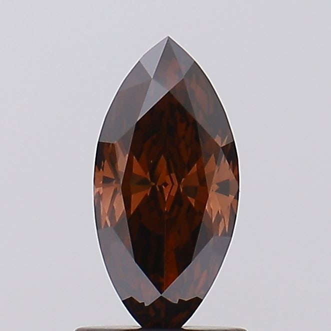 Loose Diamond - MARQUISE 1.11ct Fancy Brown VS1: Loose Diamond - MARQUISE 1.11ct Fancy Brown VS1 Source: This is a real non-mined Diamond that has been grown in a lab Shape: MARQUISE Carats: 1.11 Color: Fancy Brown Certification: IGI Video: