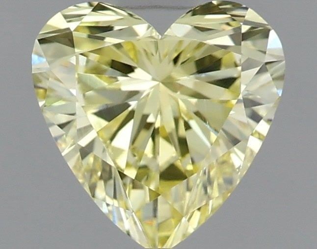 Loose Diamond - HEART 0.75ct Fancy Intense Yellow VS1: Loose Diamond - HEART 0.75ct Fancy Intense Yellow VS1 Source: This is a real non-mined Diamond that has been grown in a lab Shape: HEART Carats: 0.75 Color: Fancy Intense Yellow Certification: IGI