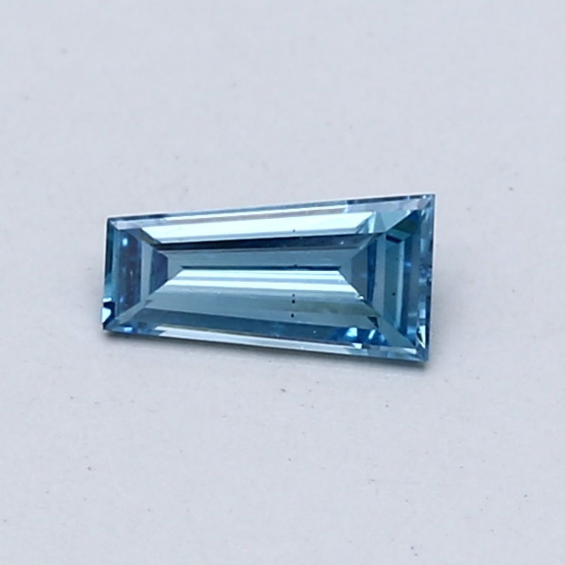 Loose Diamond - TAPERED BAGUETTE 0.25ct Fancy Intense Blue VS2: Loose Diamond - TAPERED BAGUETTE 0.25ct Fancy Intense Blue VS2 Source: This is a real non-mined Diamond that has been grown in a lab Shape: TAPERED BAGUETTE Carats: 0.25 Color: Fancy Intense Blue Cert