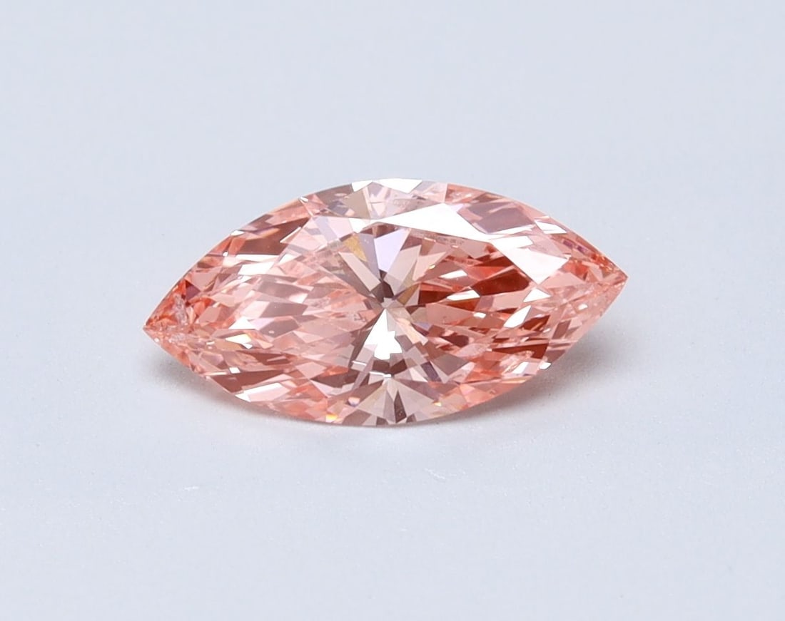 Loose Diamond - MARQUISE 0.73ct Fancy Vivid Pink SI1: Loose Diamond - MARQUISE 0.73ct Fancy Vivid Pink SI1 Source: This is a real non-mined Diamond that has been grown in a lab Shape: MARQUISE Carats: 0.73 Color: Fancy Vivid Pink Certification: IGI Video
