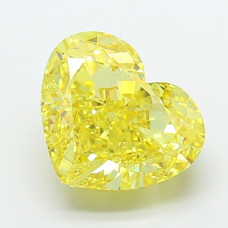 Loose Diamond - HEART 7.47ct Fancy Vivid Yellow VS1: Loose Diamond - HEART 7.47ct Fancy Vivid Yellow VS1 Source: This is a real non-mined Diamond that has been grown in a lab Shape: HEART Carats: 7.47 Color: Fancy Vivid Yellow Certification: IGI Video: