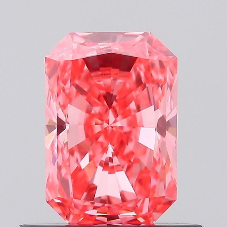 Loose Diamond - RADIANT 0.68ct Fancy Pink VS1: Loose Diamond - RADIANT 0.68ct Fancy Pink VS1 Source: This is a real non-mined Diamond that has been grown in a lab Shape: RADIANT Carats: 0.68 Color: Fancy Pink Certification: IGI Video: