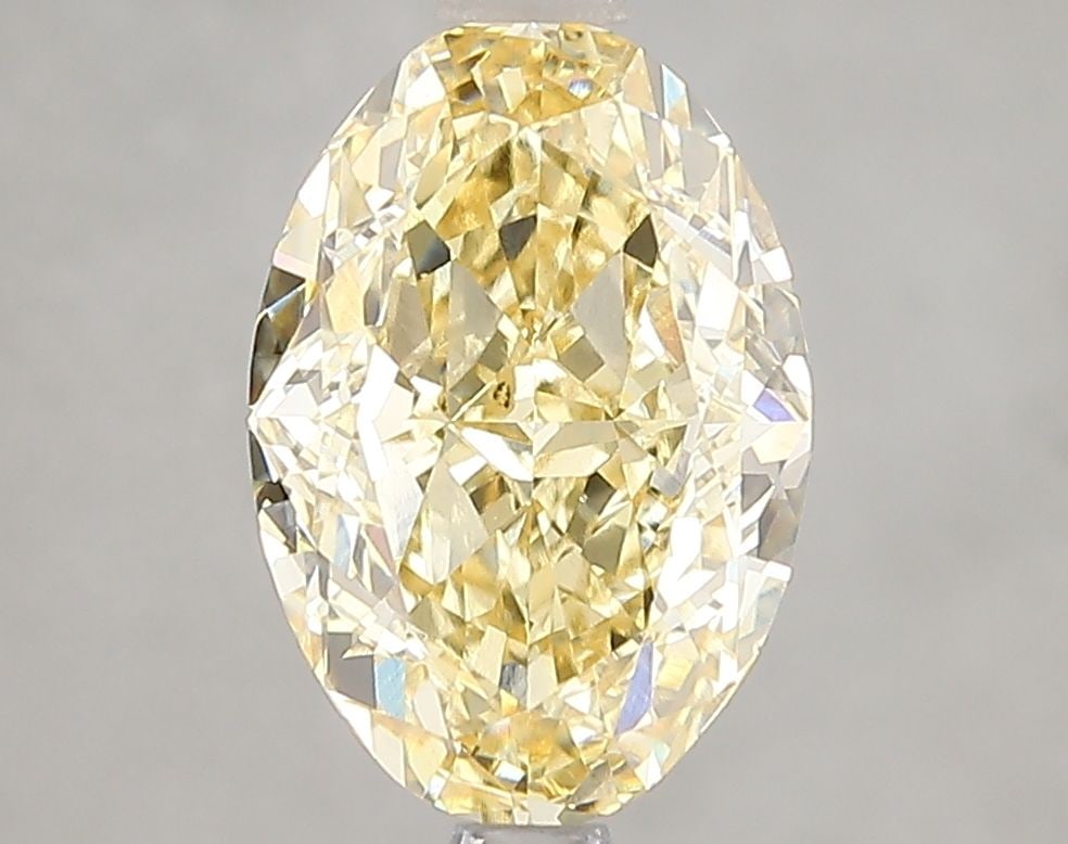 Loose Diamond - OVAL 3.01ct Fancy Intense Yellow VS1: Loose Diamond - OVAL 3.01ct Fancy Intense Yellow VS1 Source: This is a real non-mined Diamond that has been grown in a lab Shape: OVAL Carats: 3.01 Color: Fancy Intense Yellow Certification: IGI Video