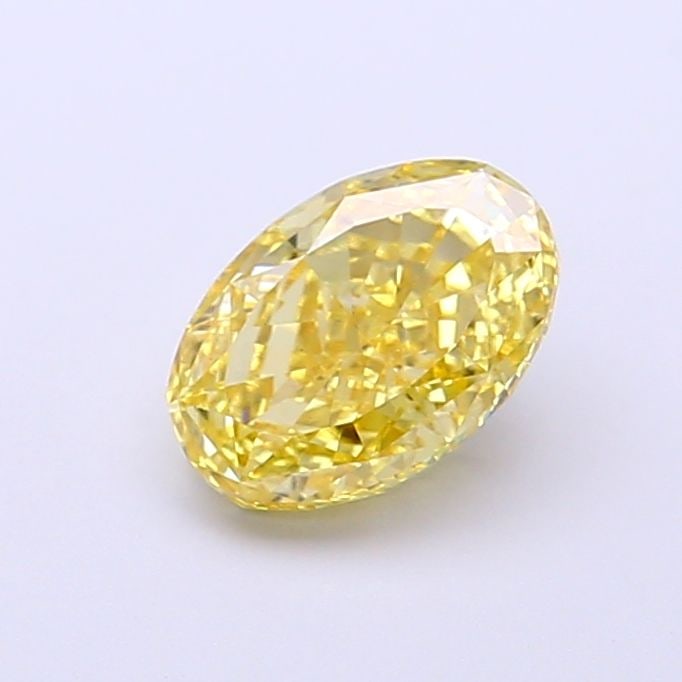 Loose Diamond - OVAL 1.03ct Fancy Vivid Yellow VS1: Loose Diamond - OVAL 1.03ct Fancy Vivid Yellow VS1 Source: This is a real non-mined Diamond that has been grown in a lab Shape: OVAL Carats: 1.03 Color: Fancy Vivid Yellow Certification: IGI Video: