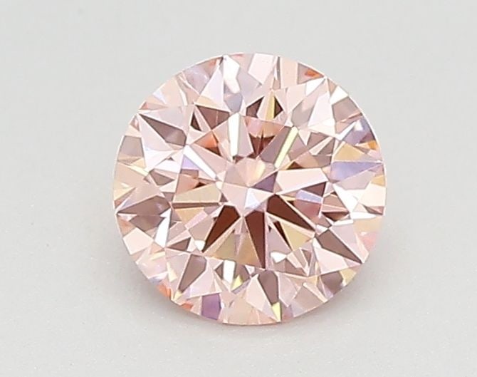 Ideal Loose Diamond - ROUND 0.45ct Fancy Vivid Pink VVS2: Ideal Loose Diamond - ROUND 0.45ct Fancy Vivid Pink VVS2 Source: This is a real non-mined Diamond that has been grown in a lab Shape: ROUND Carats: 0.45 Color: Fancy Vivid Pink Certification: IGI